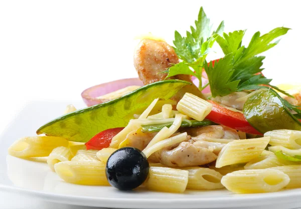 Penne with vegetables and meat — Stock Photo, Image