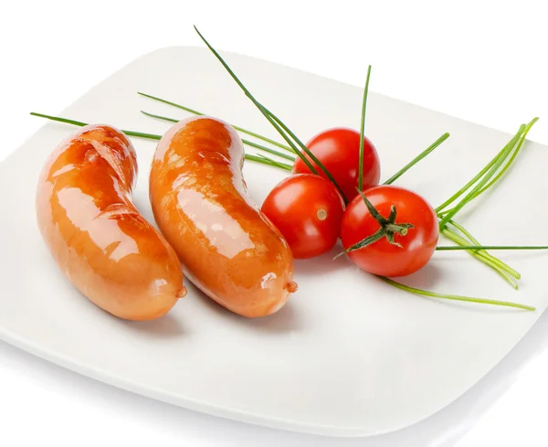 Linguiça com tomates — Fotografia de Stock
