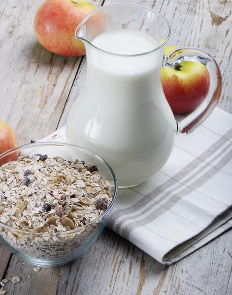 Healthy breakfast - muesli, milk and apples — Stock Photo, Image