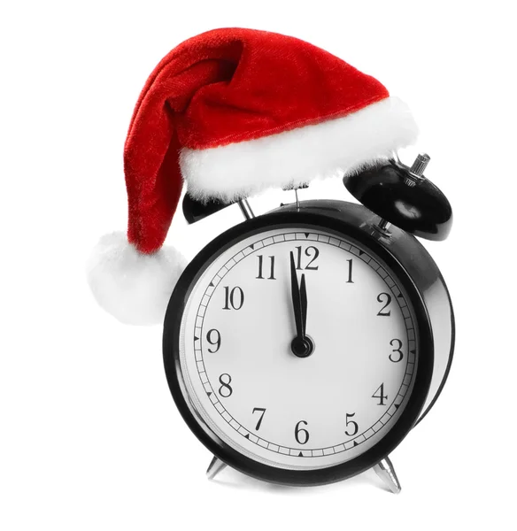 Reloj despertador con sombrero de Santa aislado en blanco — Foto de Stock