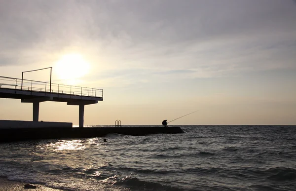Puesta de sol en la orilla del mar —  Fotos de Stock