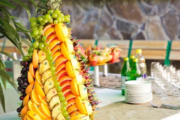 Fruits on silver stand — Stock Photo, Image