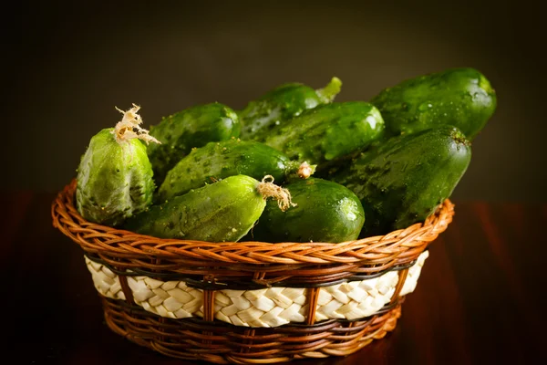 Cucumbers on black — Stock Photo, Image