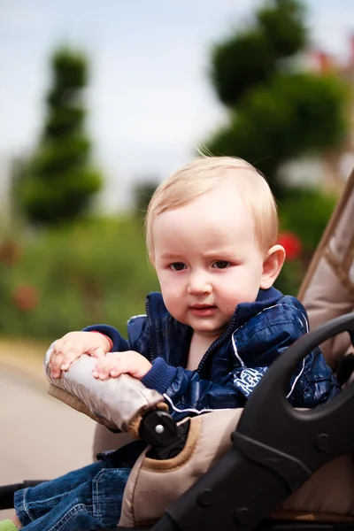 Toddler in baby carriage — Stock Photo, Image