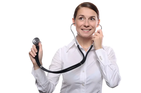 Ärztin hört mit Stethoskop zu — Stockfoto
