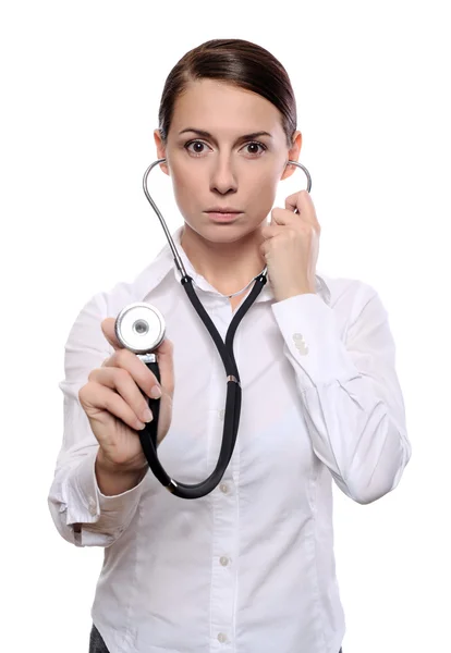 Ženský lékař naslouchat se stetoskopem — Stock fotografie