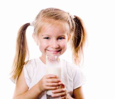 Portrait of a little girl holding a cup of milk clipart