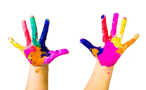 Manos de niño pintadas en pinturas coloridas — Foto de Stock