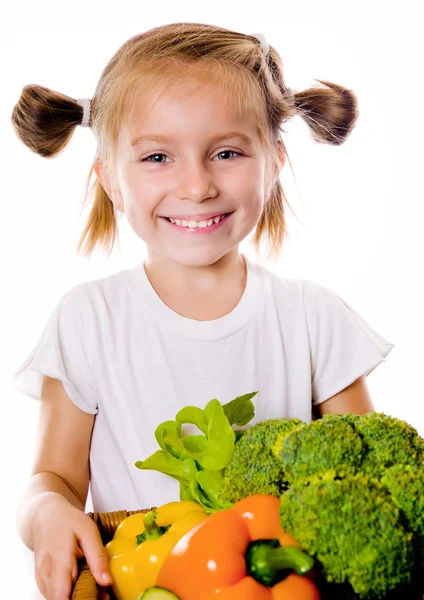 Petite fille aux légumes — Photo