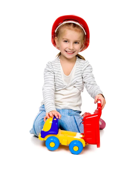 Μικρό κορίτσι με ένα μεγάλο αυτοκίνητο — Φωτογραφία Αρχείου