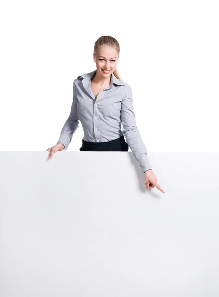 空白の後ろに立っている女性実業家 — ストック写真