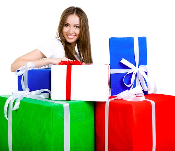 Pretty young woman with gifts — Stock Photo, Image