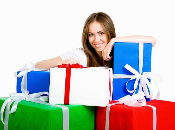 Pretty young woman with gifts — Stock Photo, Image