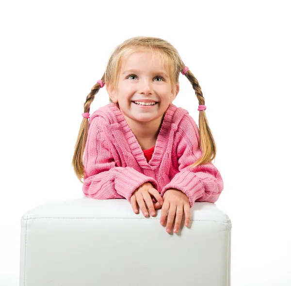 Милая маленькая девочка с косичками — стоковое фото