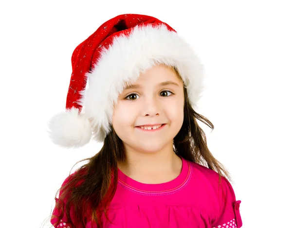 Liten flicka i en jultomten hatt — Stockfoto