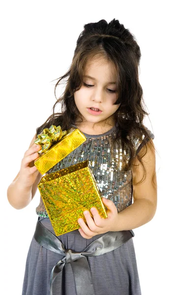 Schattig meisje met een cadeau Stockfoto