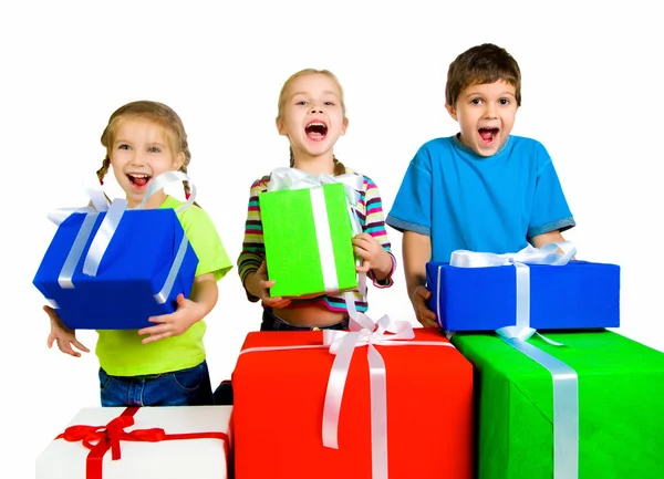 Little kids with a gifts — Stok fotoğraf