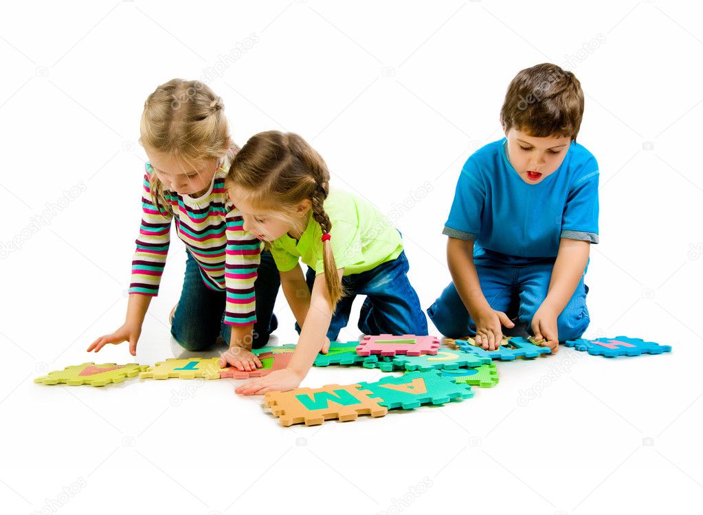Children are playing letters