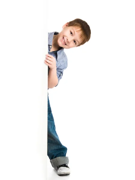 Kind hinter einem Brett — Stockfoto