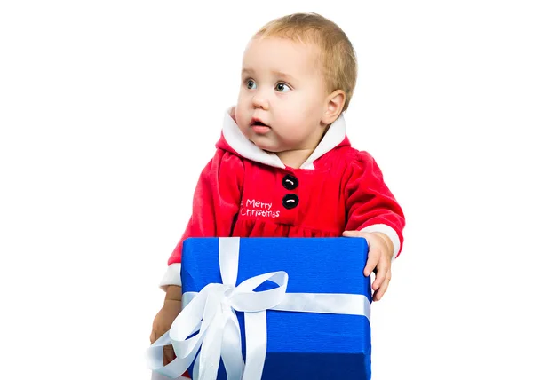 Dziewczyna w stroju santa z prezentami — Zdjęcie stockowe