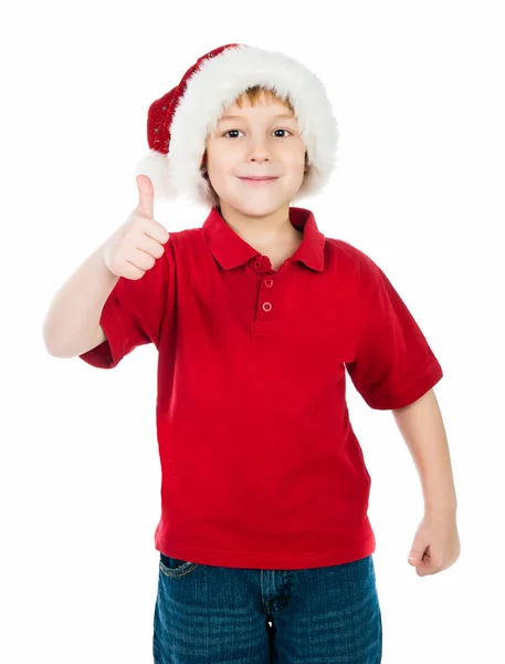 Malý chlapec v santa claus klobouk — Stock fotografie