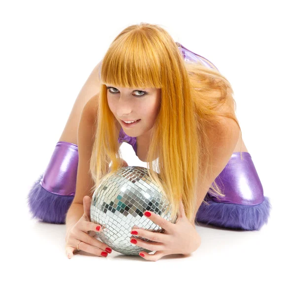 Beautiful young blonde holding a big disco ball — Stock Photo, Image