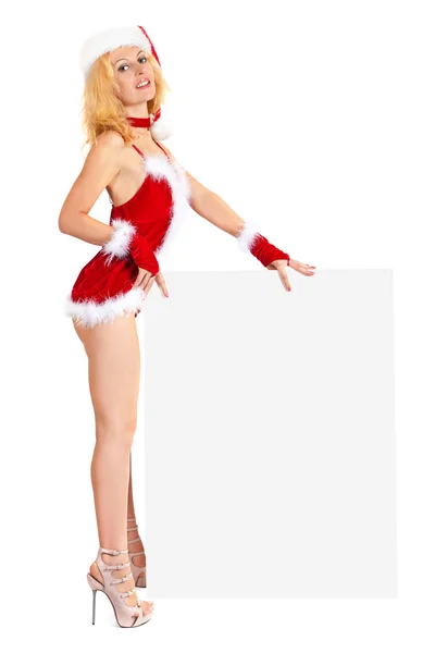 Jeune femme sexy Santa tient une affiche — Photo