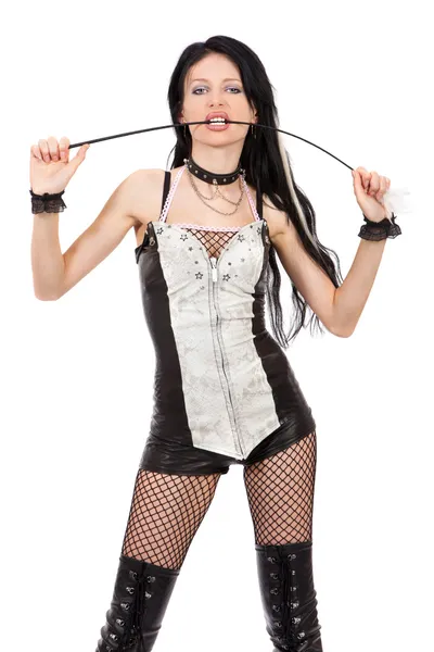 Sexy domina is holding a whip — Stock Photo, Image