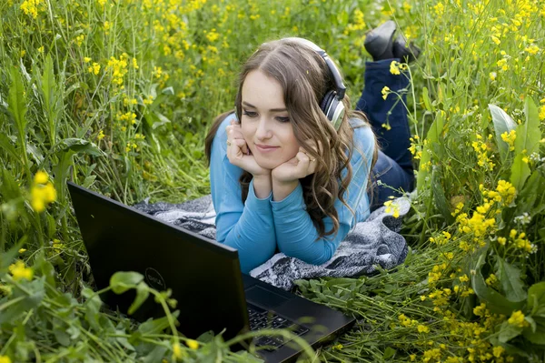 stock image Beautiful woman with a laptop