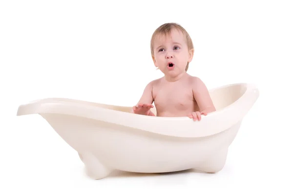 Baby sitting in a bath — Stock Photo, Image