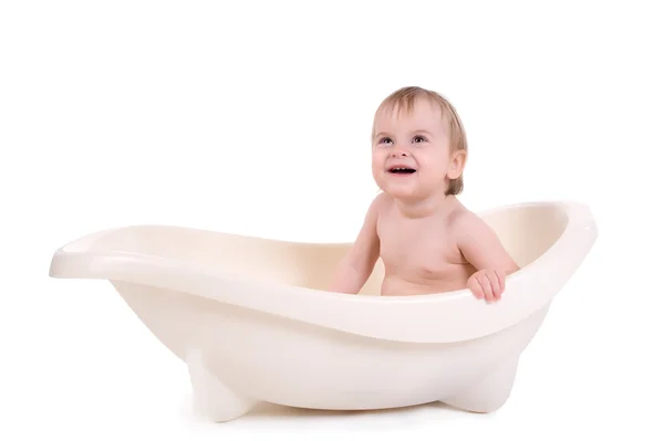 Bebé sentado en un baño —  Fotos de Stock