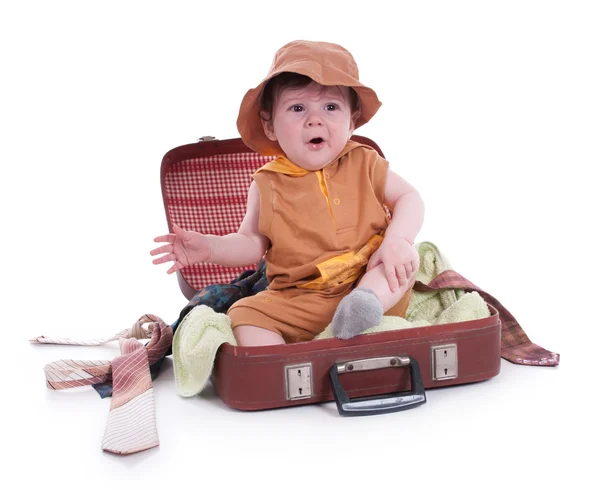 Küçük Çocuk Bir Bavulun Içinde Oturuyor Stok Fotoğraf