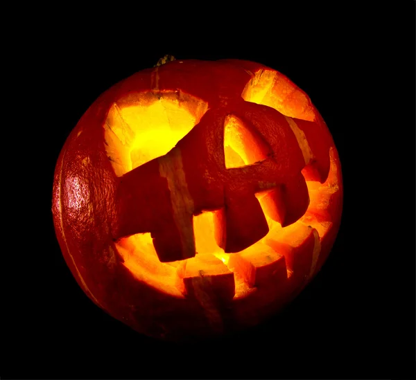 Halloween, vecchio jack-o-lanterna su nero — Foto Stock