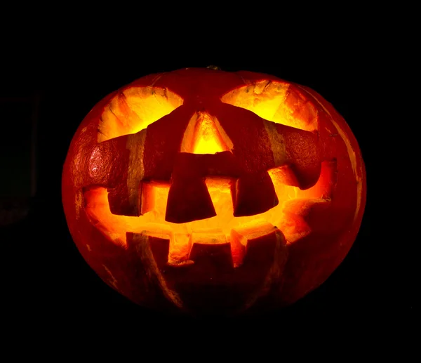 Halloween, old jack-o-lantern on black — Stock Photo, Image