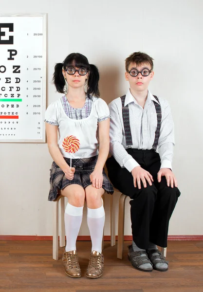 stock image Two person wearing spectacles in an office at the doctor