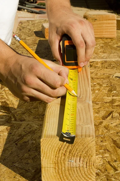 Worker Measuring Wood — Stock Photo, Image