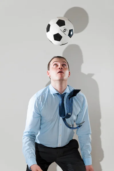 Playing football at office — Stock Photo, Image