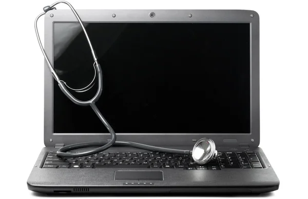 Stethoscoop op laptop — Stockfoto