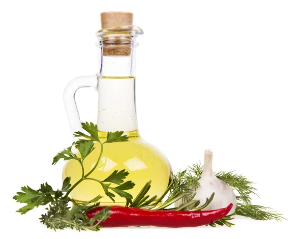 Bottiglia di olio vegetale e spezie — Foto Stock