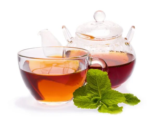 Taza con té y tetera — Foto de Stock