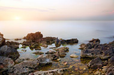 Deniz ve gün batımı, rock.