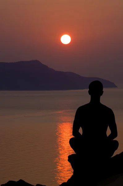 Meditation at the sunset. — Stock Photo, Image