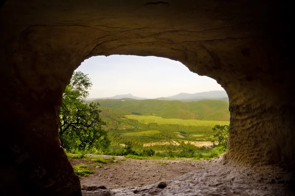 stock image Cave in mountain on sunrise.