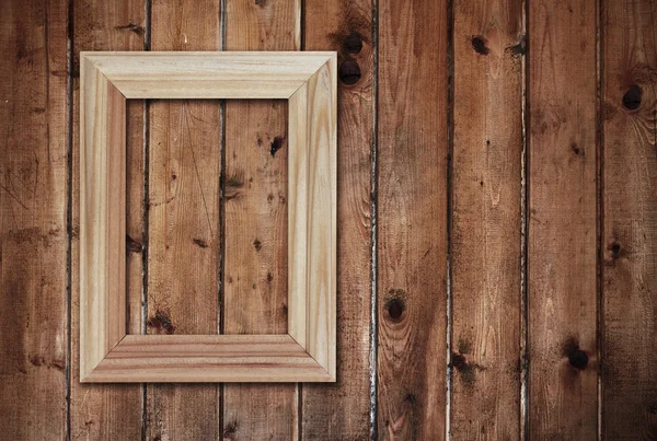 Rahmen an Holzwand — Stockfoto