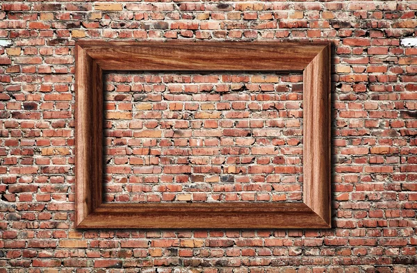 Рамка на кирпичной стене — стоковое фото