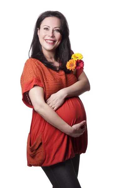 Ενηλίκων έγκυος γυναίκα με λουλούδια — Φωτογραφία Αρχείου