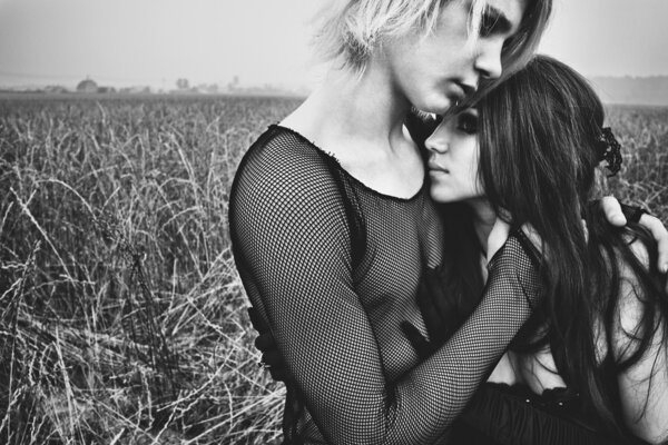 Young goth couple outdoors
