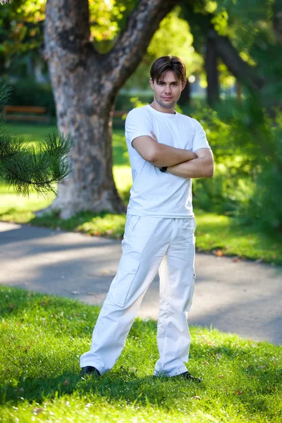 Young man in park — Stock Photo, Image