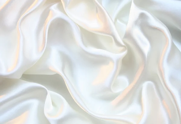 Glatte elegante weiße Seide als Hintergrund — Stockfoto