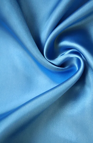 Soepele elegante blauwe zijde als achtergrond — Stockfoto